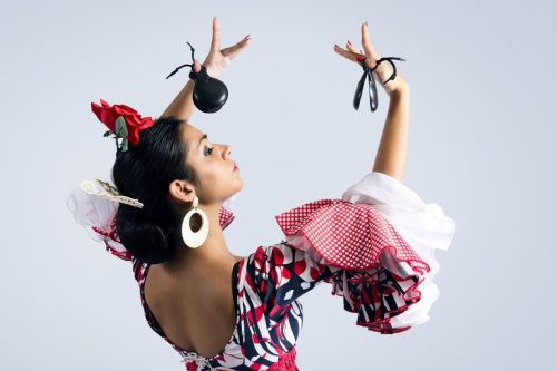 Portrait of young Flamenco dancer in beautiful dress